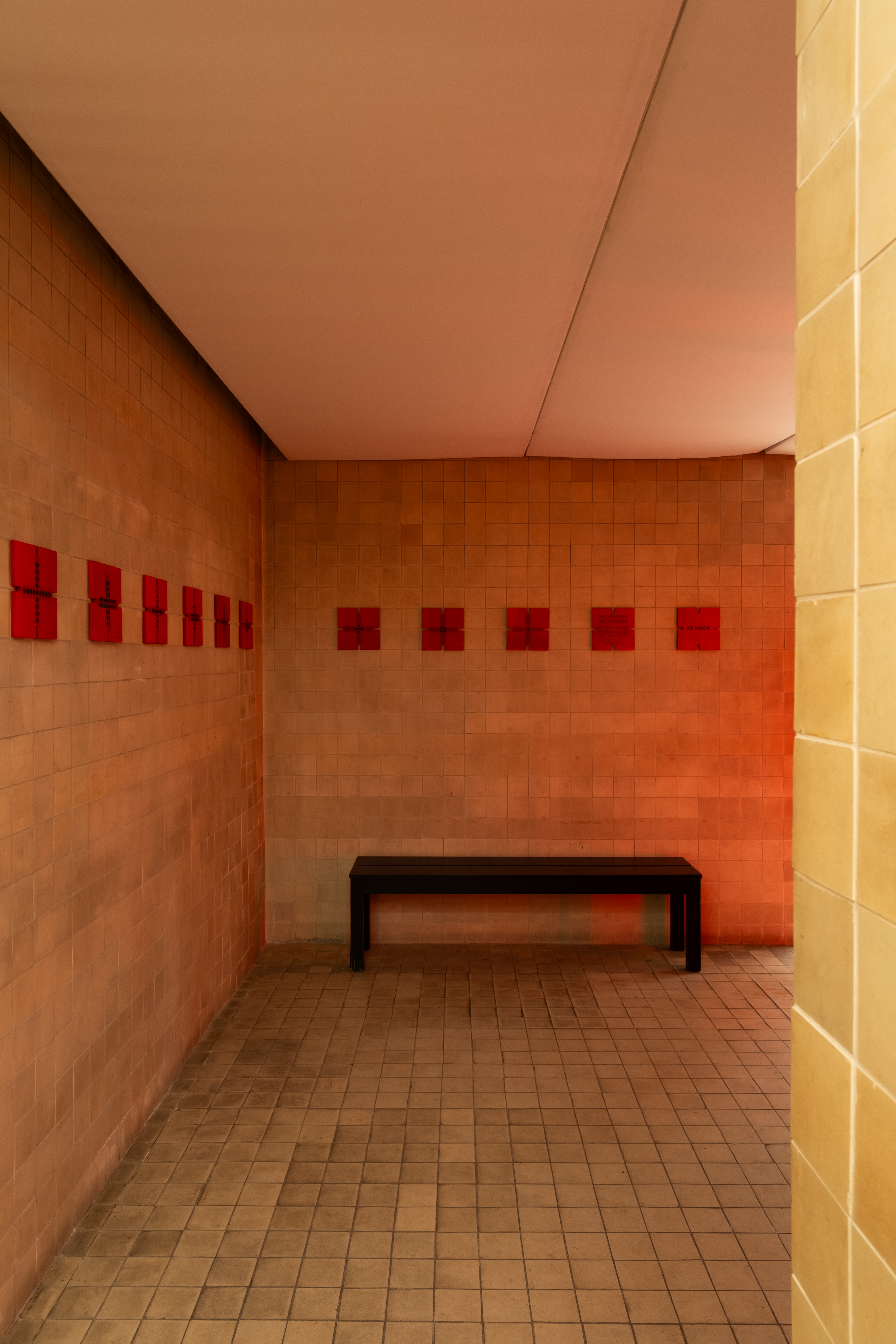 Trail of red modules along the gallery wall — Bir Arada — Together, Maçka Sanat Galerisi