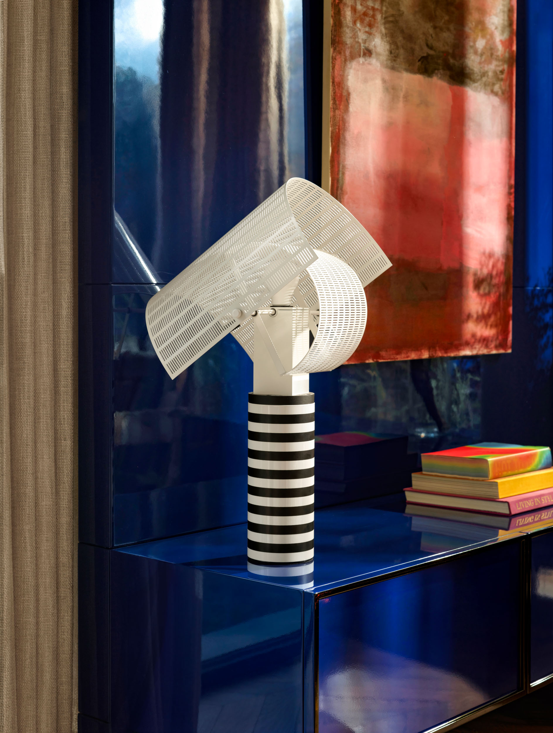 Striped Shogun lamp against cobalt lacquer panelling — Zekeriyakoy TP House detail
