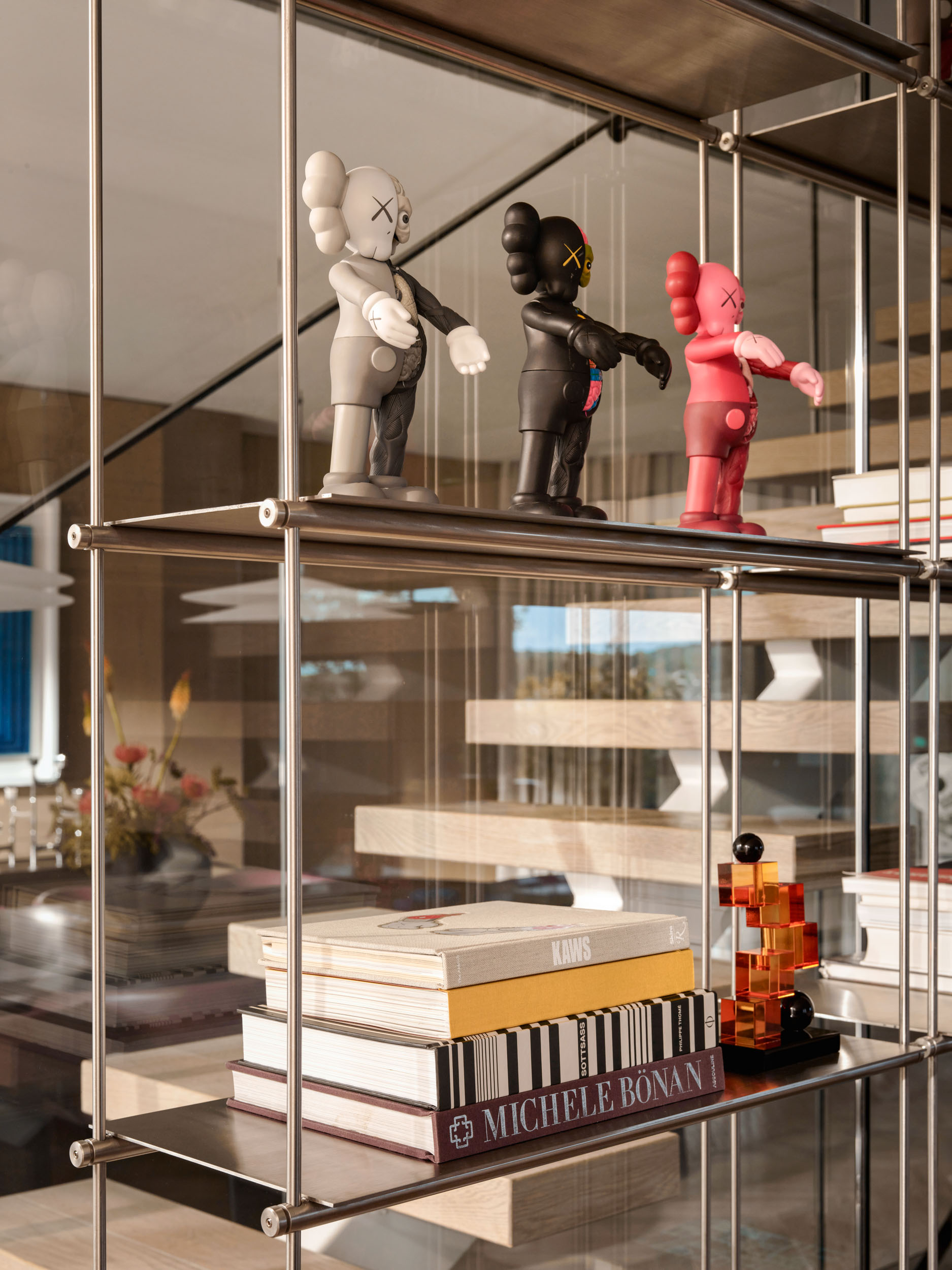 Steel and glass shelving with collectible art toys — Zekeriyakoy TP House, Istanbul villa