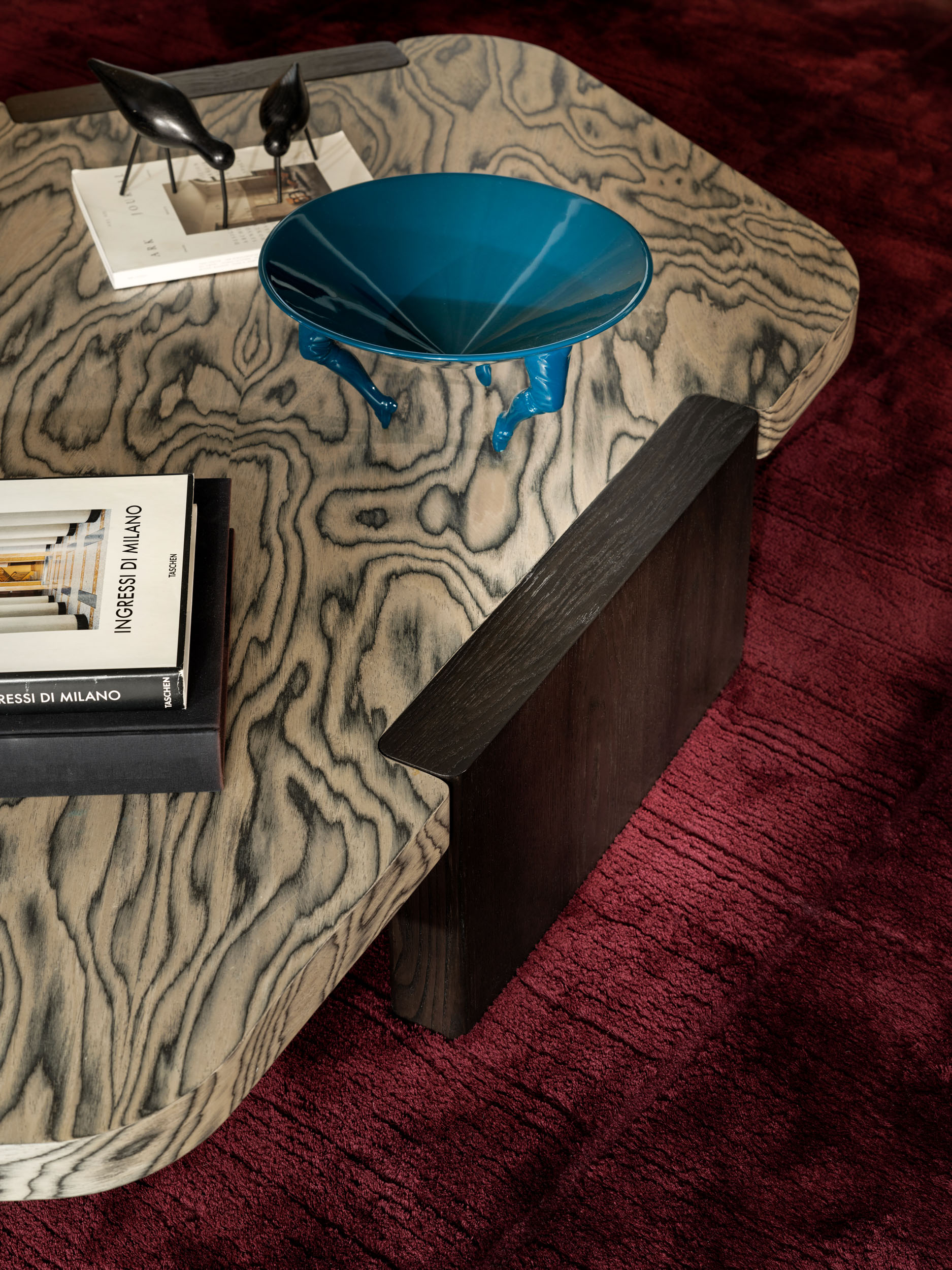 Marbled-wood coffee table with turquoise glass bowl — Zekeriyakoy TP House detail