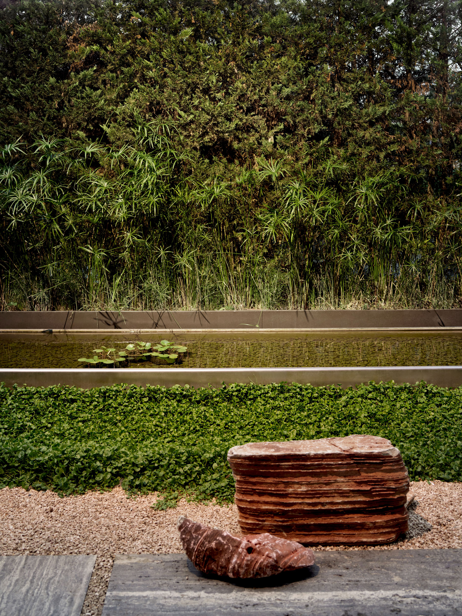 Garden pond with layered stone sculpture — landscape design, Zekeriyakoy TP House